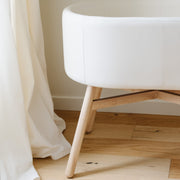 M26834GYLB,Babyletto,babyletto x GATHRE Capsule Bassinet in Ivory